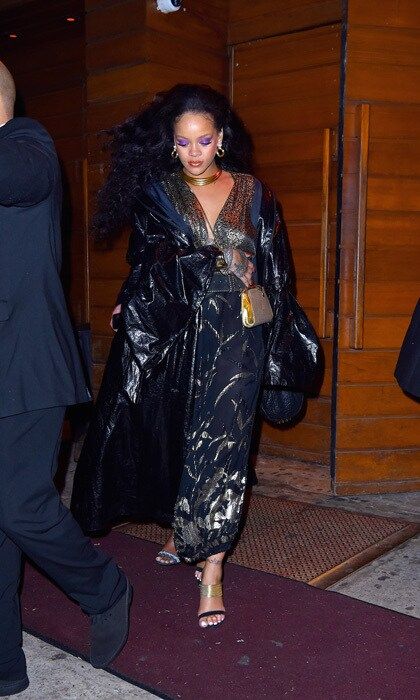 Rihanna changed into a black and gold number to hit the after-party circuit. The singer met up with her boyfriend Hassan Jameel after the show. The two were seen leaving 1 OAK separately around 3:45 a.m.
Photo: GC Images