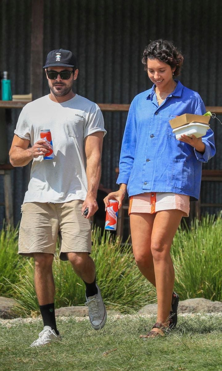 Zac Efron holds hand with Vanessa Valladares on a lunch outing in Byron Bay.