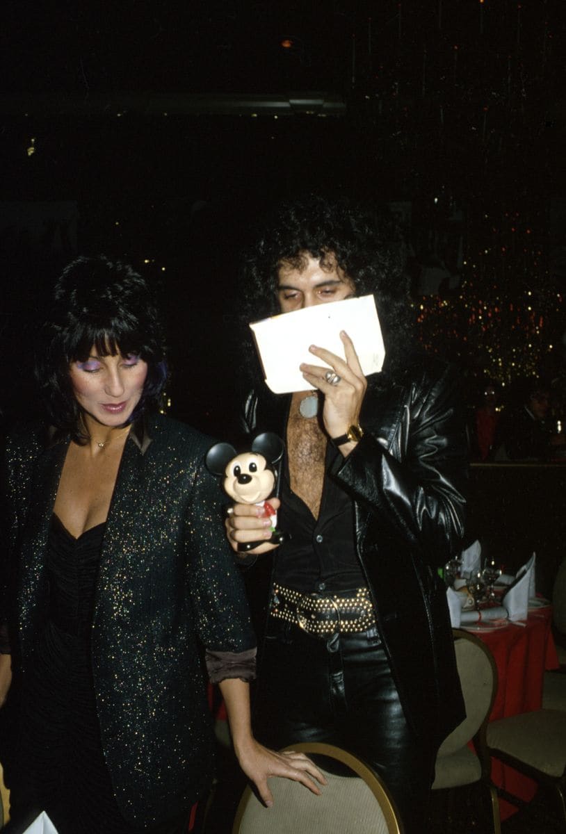 DECEMBER 1979: Entertainers and celebrity couple Gene Simmons and Cher attend the premiere of the movie "Kramer vs. Kramer" in December 1979. (Photo by Michael Ochs Archives/Getty Images) 