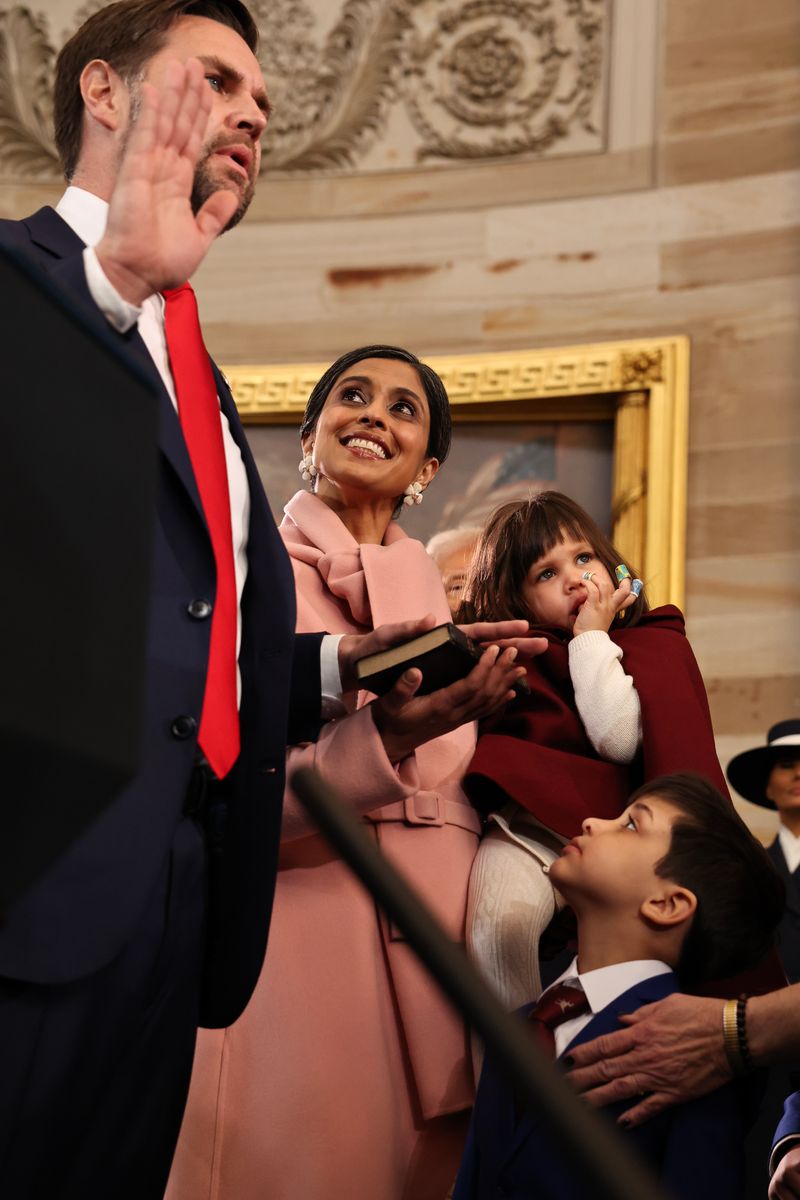 WASHINGTON, DC - JANUARY 20: Usha Vance looks on as U.S. Vice President-elect former Sen. J.D. Vance (R-OH) is sworn in during inauguration ceremonies in the Rotunda of the U.S. Capitol on January 20, 2025 in Washington, DC. Donald Trump takes office for his second term as the 47th president of the United States. (Photo by Chip Somodevilla/Getty Images)