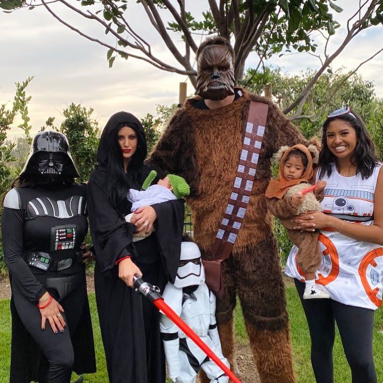 Pau Gasol, Cat McDonnell, and their baby Ellie with the Bryant family on Halloween