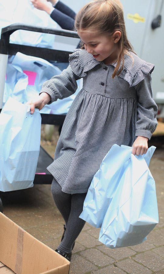 Kate Middleton’s daughter was pictured volunteering in her fifth birthday pictures