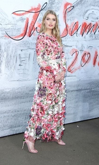 Stunning serpentine socialite! The day before the V&A bash, the fashionista opted for Dolce & Gabbana floral-realness once again, while attending the Serpentine Gallery summer party at the Serpentine Gallery on June 19 in London.
On Instagram, she called the look: "Flower Power."
Photo: Mike Marsland/WireImage