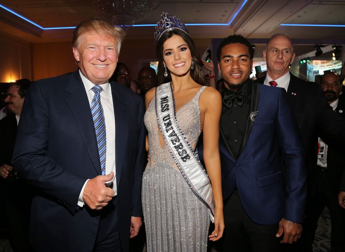 DORAL, FL - JANUARY 25: Donald Trump, Miss Universe Paulina Vega and DeSean Jackson attend the Venue Magazine Official Miss Universe after party at Trump National Doral on January 25, 2015 in Doral, Florida. (Photo by Alexander Tamargo/Getty Images for Venue Magazine)