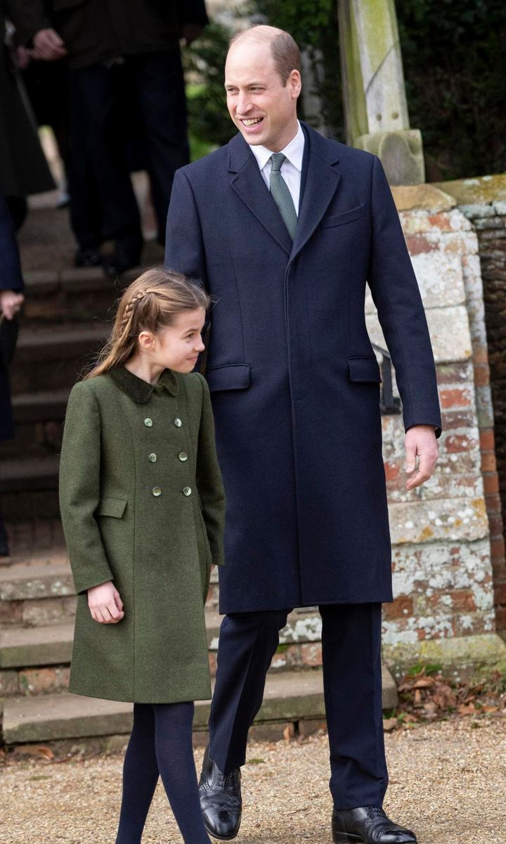 Prince William's green tie complemented his daughter's coat.