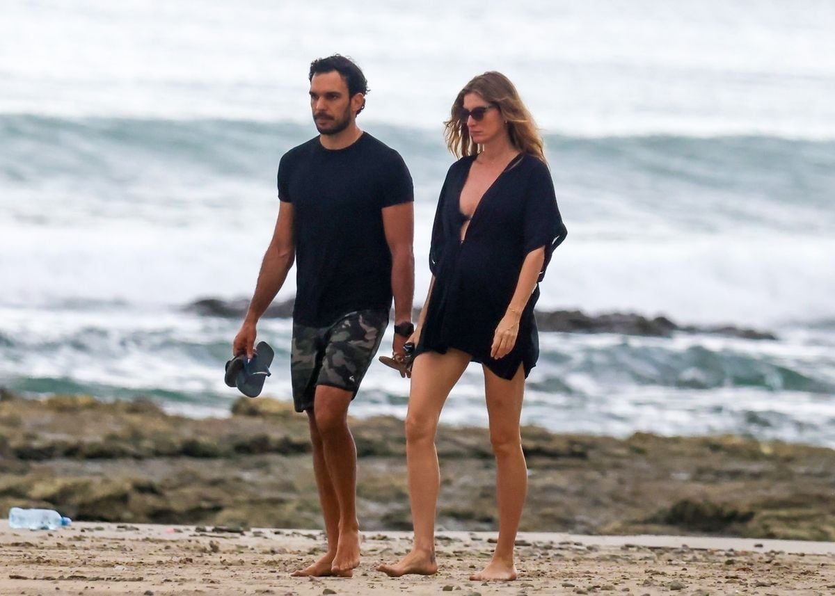 Watch Gisele Bündchen and Joaquim Valente enjoy their beach day with strolls and surfing