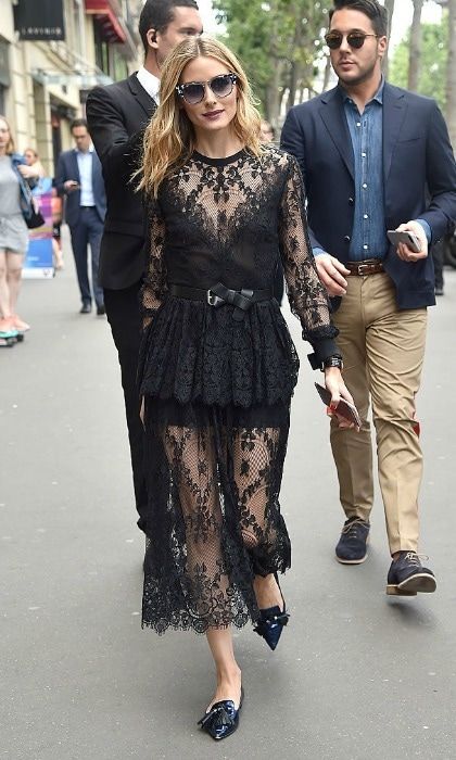 <a href="https://us.hellomagazine.com/tags/1/Olivia-Palermo" target="_blank" style="font-weight: bold;">Olivia Palermo</a> turned the streets of Paris into her own personal runway as she stepped out in a daring, black lace number for Elie Saab.
<br>
Photo: Jacopo Raule/GC Images