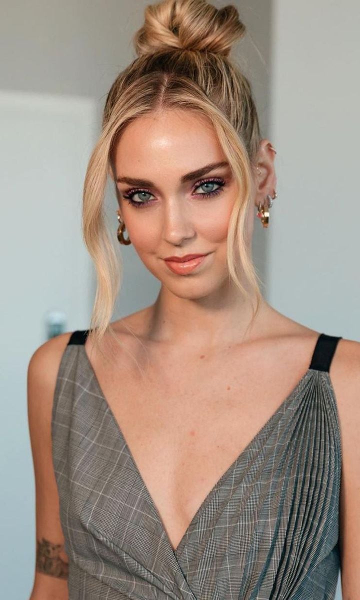 Chiara Ferragni wears her hair pulled back with two hair wisps in front