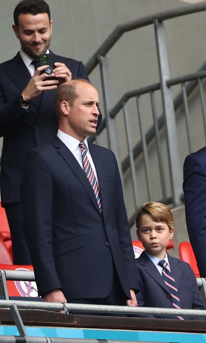 The future King twinned with his dad Prince William wearing a suit and tie.