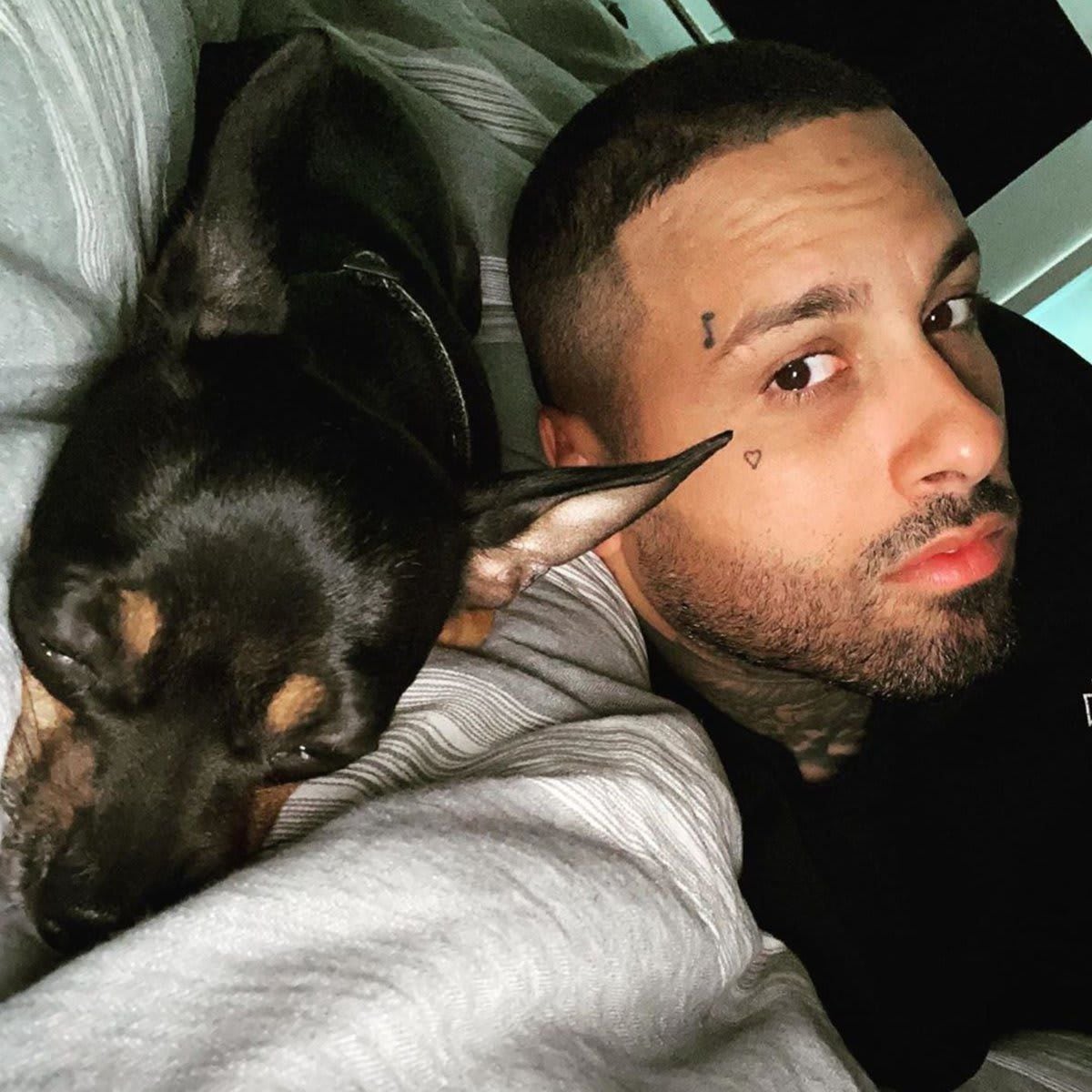 Nicky Jam and his dog