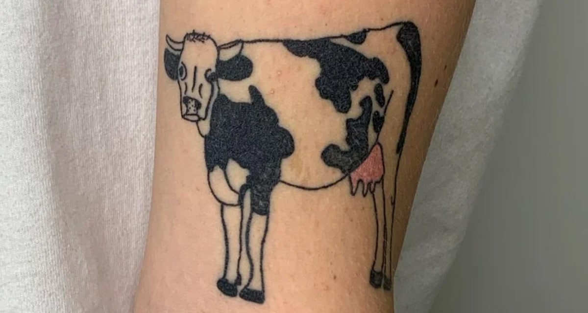 Cow on her left arm