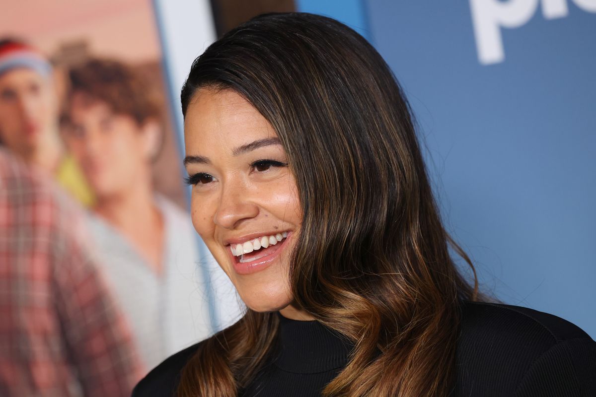 Gina Rodriguez attends a photo call for Netflix's "Players" at The Egyptian Theatre Hollywood on February 08, 2024, in Los Angeles, California. 
