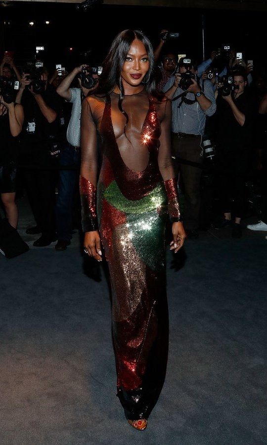 All eyes (and lenses) on Naomi Campbell as she sparkled in a low-cut Tom Ford number at the designer's Fall 2016 fashion show at the Four Seasons in NYC on Wednesday night.
Photo: Getty Images