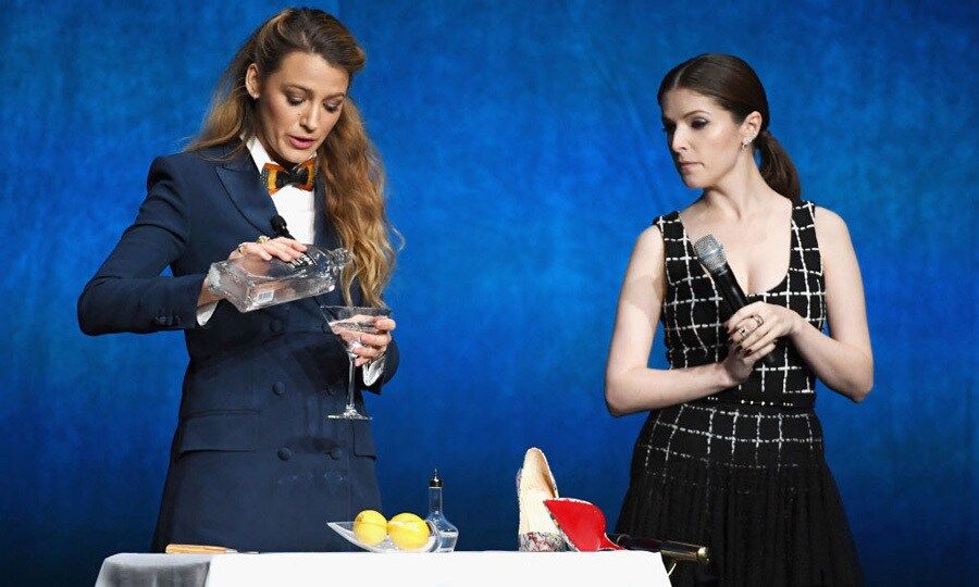 Hey bartender! Blake Lively poured a stiff one as Anna Kendrick seemed to approve while on stage during Lionsgate CinemaCon event in Las Vegas.
Photo: Getty Images