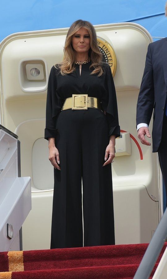 Oversized gold accessories added some of Melania's signature opulent glam to her little black Stella McCartney jumpsuit as she arrived at King Khalid International Airport in Riyadh on May 20, 2017.
Photo: MANDEL NGAN/AFP/Getty Images