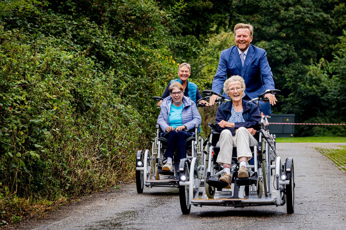 MIRNS, NETHERLANDS - SEPTEMBER 4: King Willem-Alexander of The Netherlands meets with a resident as he attends the 75th anniversary of De Zonnebloem on September 4, 2024 in Mirns, Netherlands. De Zonnebloem is committed to people with a physical disability. (Photo by Patrick van Katwijk/Getty Images)