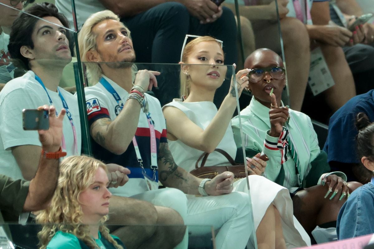 Ariana Grande and her brother Frankie Grande (left) attend day two of the Paris 2024 Olympic Games at the artistic gymnastics event with Simone Biles of the USA at Paris Arena on July 28, 2024, in Paris, France. 