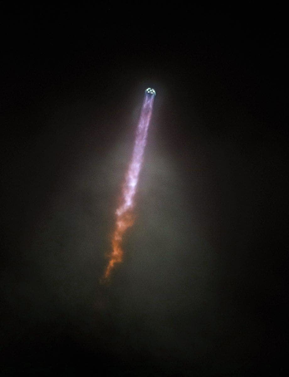 Blue Origin New Glenn rocket soars through a cloud after lifting off from the Kennedy Space Center on its maiden flight