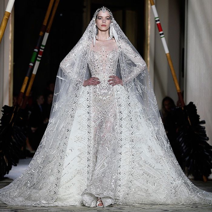 <b>ZUHAIR MURAD</B>
The Lebanese designer, who is a favorite of such superstars as Beyonce, sent this glittering silver design down the catwalk, with a full skirt, signature luxe beading and cascading embroidered veil.
Photo: Getty Images