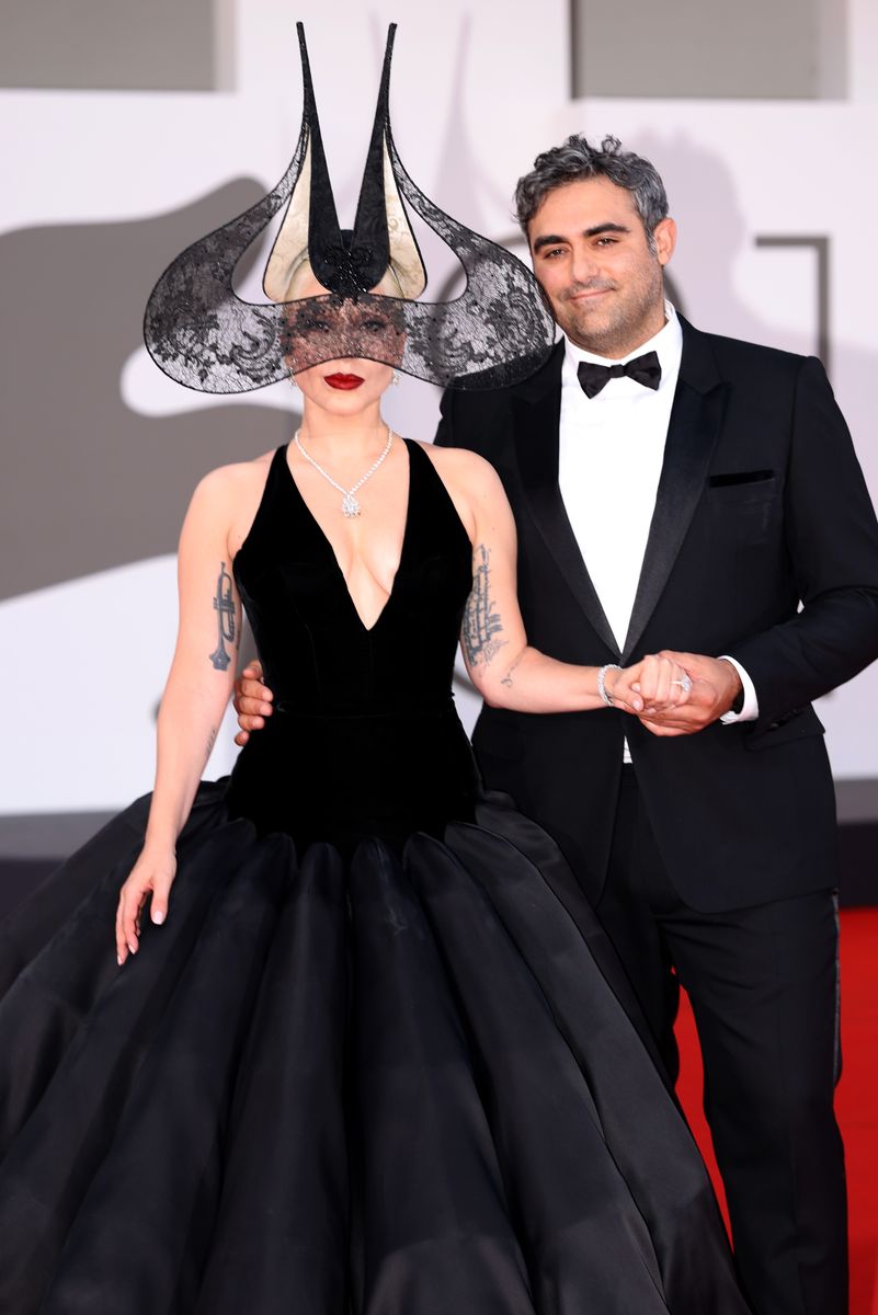 Lady Gaga and Michael Polansky attend the "Joker: Folie à Deux" red carpet during the 81st Venice International Film Festival 