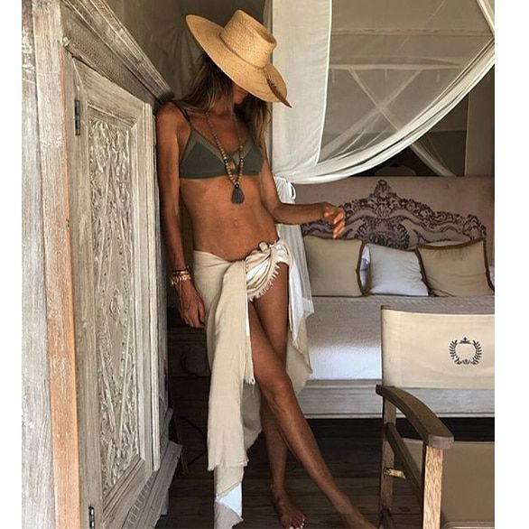 <b>Elle Macpherson</B>
Supermodel Elle Macpherson shows of her long legs and lean figure while posing in her Elle Macpherson Body lingerie line. The 53-year-old rocks an olive top, stylish straw hat, beaded necklace, and cream-colored sweater tied around her waist.
Photo: Instagram/ @ellemacpherson