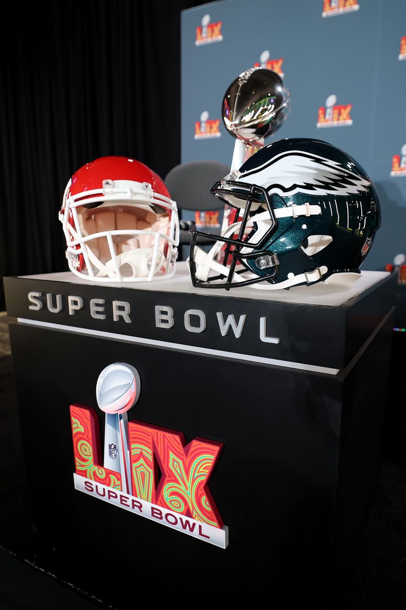 NEW ORLEANS, LOUISIANA - FEBRUARY 03: A Kansas City Chiefs helmet, the Vince Lombardi Trophy and a Philadelphia Eagles helmet are seen before the NFL Commissioner Roger Goodell's Super Bowl Press Conference ahead of Super Bowl LIX at Caesars Superdome on February 03, 2025 in New Orleans, Louisiana. (Photo by Chris Graythen/Getty Images)