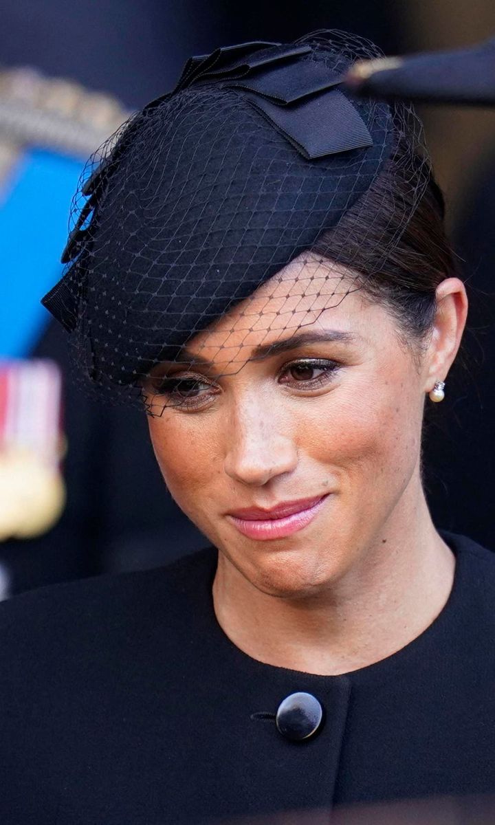 The Duchess of Sussex reportedly wore diamond and pearl earrings that were given to her by her late grandmother-in-law, Queen Elizabeth.