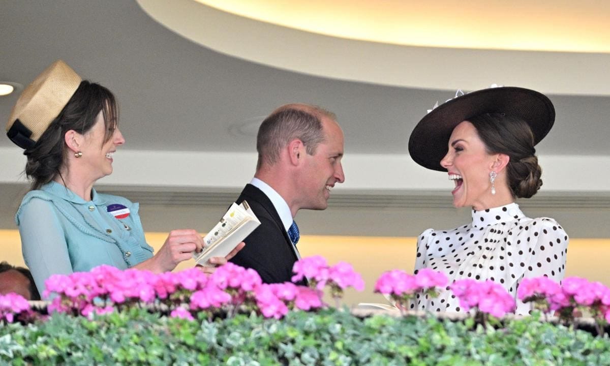 Kate was seen laughing at the racecourse on June 17.