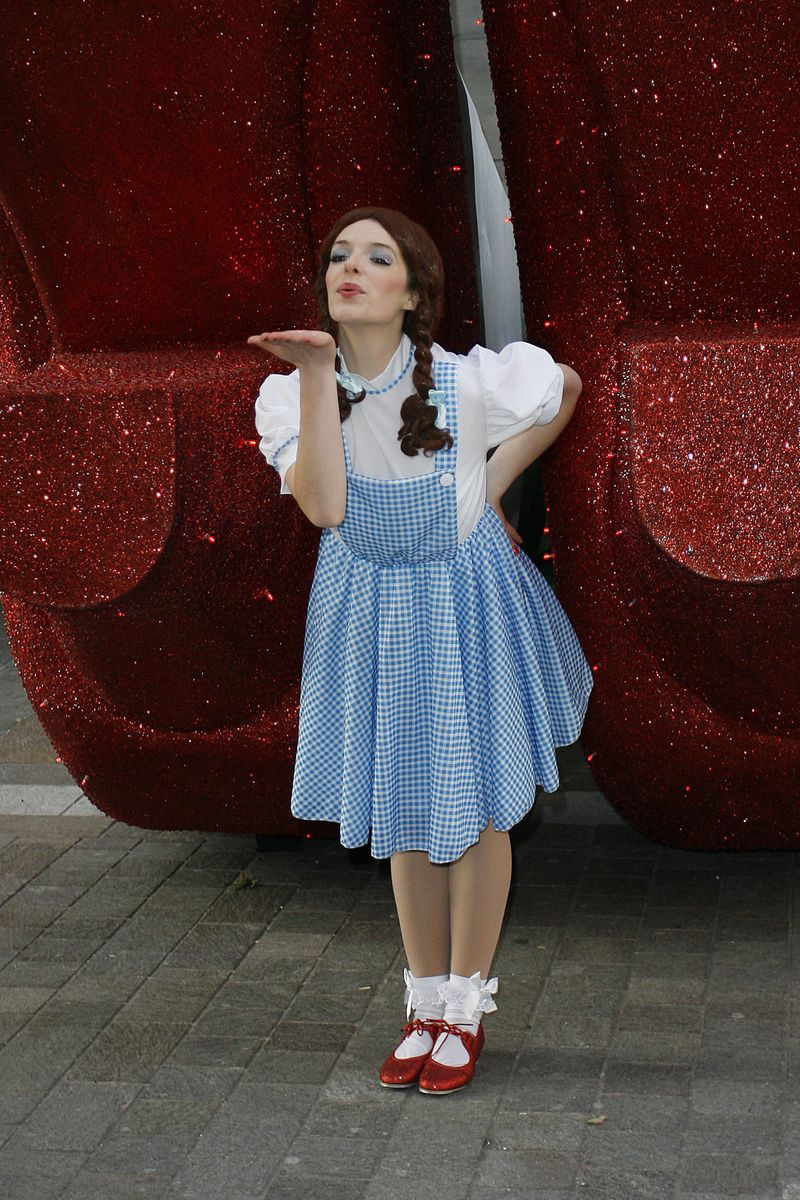 LONDON, UNITED KINGDOM - DECEMBER 01: A Dorothy Gale look-a-like poses as Harrods opens their Wicked Witch Of The East display on December 1, 2009 in London, England. (Photo by Neil Mockford/Getty Images)