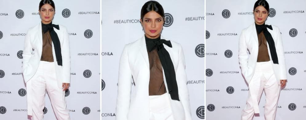 Priyanka Chopra impacted with her power suit and transparent blouse in Los Angeles