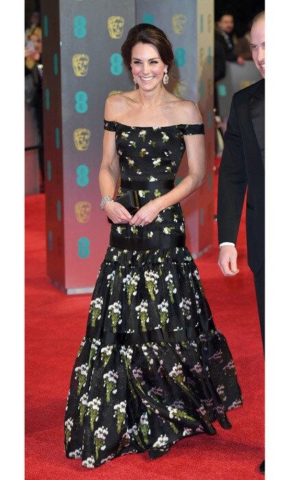 The Duchess of Cambridge exuded Hollywood glamour stepping out to the 70th EE British Academy Film Awards in London wearing a floral printed, off-the-shoulder gown by Alexander McQueen, which featured a tiered skirt.
Photo: Karwai Tang/WireImage