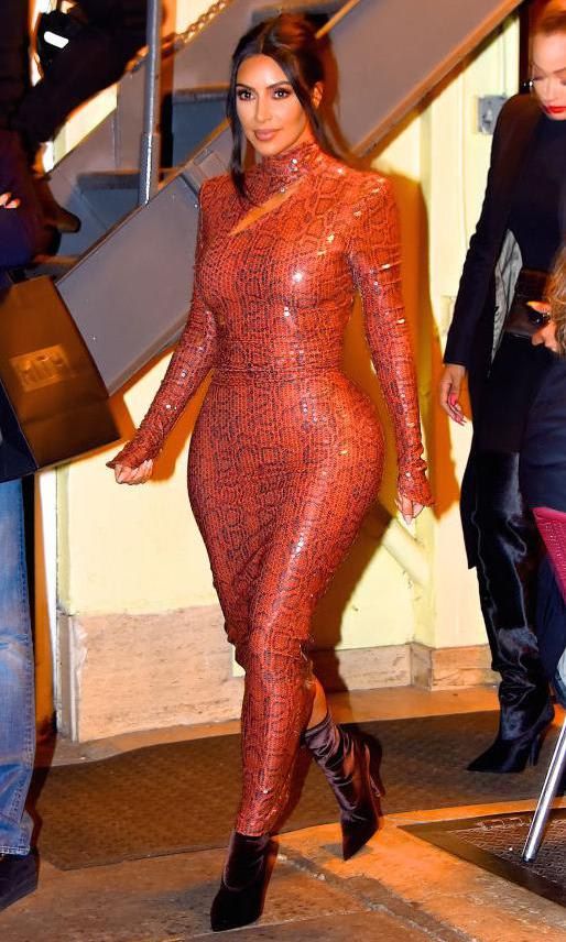 Kim Kardashian in a long snakeskin print latex dress