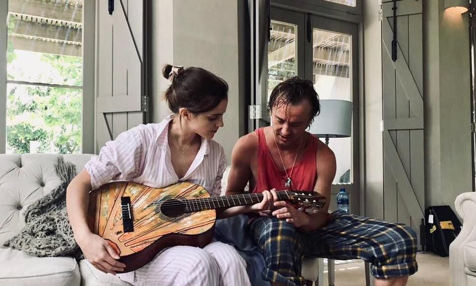 Emma Watson and Tom Felton play guitar