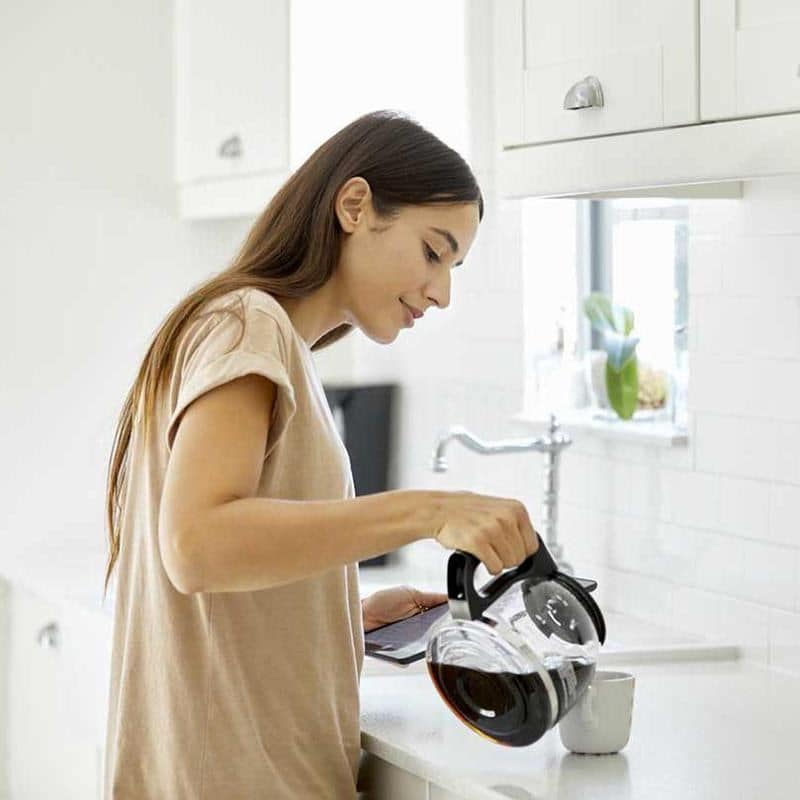 Woman pouring coffee