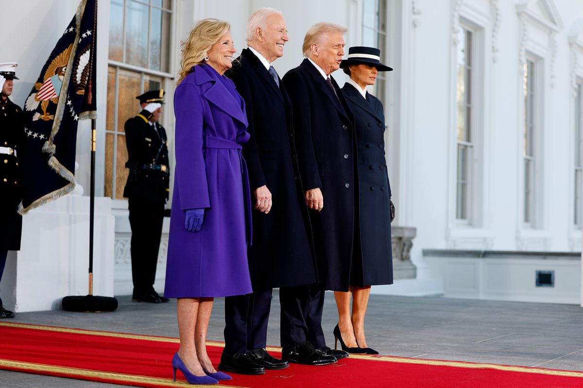 Mrs. Trump looked elegant in a navy coat and matching hat