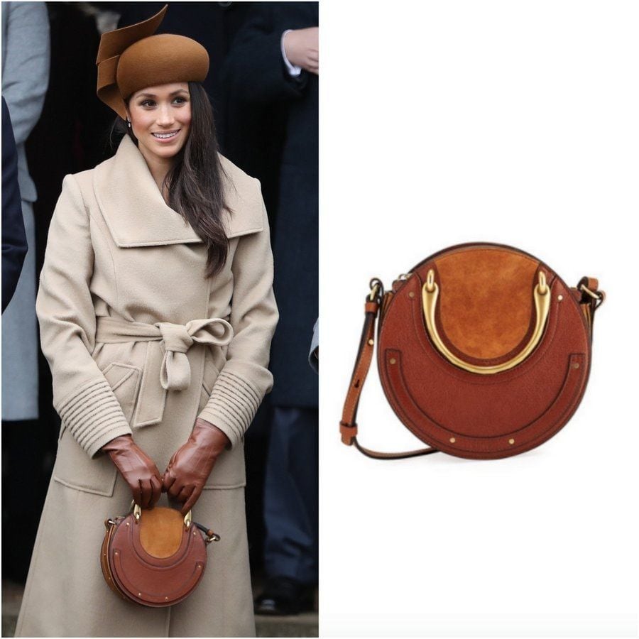 <B>The Pixie Small Round Tote Bag by Chloe</B>
It was one of the most important royal moments for new royal bride-to-be Meghan, who was attending the Christmas church service with Queen Elizabeth at Sandringham for the first time on December 25, 2017. For the special occasion, Prince Harry's love combined two of her her go-to favorites brown suede and a top handle bag with this paneled calfskin design with brass hardware by Chloe, which retails for $1,500 at Neiman Marcus.
Photo: Getty Images, neimanmarcus.com