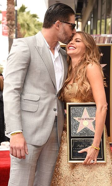 The 'Magic Mike' star plants a smooch on his fiancee's forehead after she was honored with a star on the Hollywood Walk of Fame (though something tells us these two already had stars in their eyes long before).
<br>
Photo: WireImage