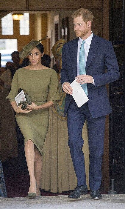 Meanwhile, proud aunt Meghan championed both American and British designers, plus suede pumps by Spaniard Manolo Blahnik.
Her olive-green dress, by Ralph Lauren, featured a number of the favored elements in her new royal uniform: a boat neck, a skinny belt and a figure-skimming silhouette. The royal accessorized the ensemble with a slanted hat by British milliner Stephen Jones, who also designed the white beret she wore on Commonwealth Day and a matching bag and gloves.
Photo: DOMINIC LIPINSKI/AFP/Getty Images