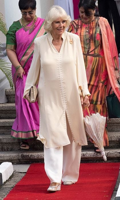 Traveling in Southeast Asia, Camilla, Duchess of Cornwall beat the heat in a silk caftan and trousers on November 7. The royal was with husband Prince Charles visiting St George & Otilde's Church in Penang, Malaysia.
Photo: Arthur Edwards - Pool / Getty Images