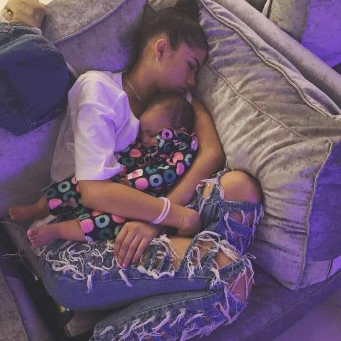 Zendaya was #NYEgoals when she opted for a cozy night in. The actress posted a photo of her snuggled up on the couch with a small child, writing: "While everyone else is turnin up....goodnight."
Photo: Instagram/@zendaya