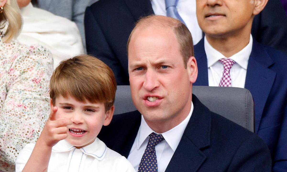 The Prince pointed out something to his father during the pageant.