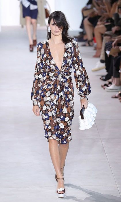 Flower power! Kendall Jenner rocked the runway in a twist front knot dress at the Michael Kors show.
Photo: Antonio de Moraes Barros Filho/FilmMagic