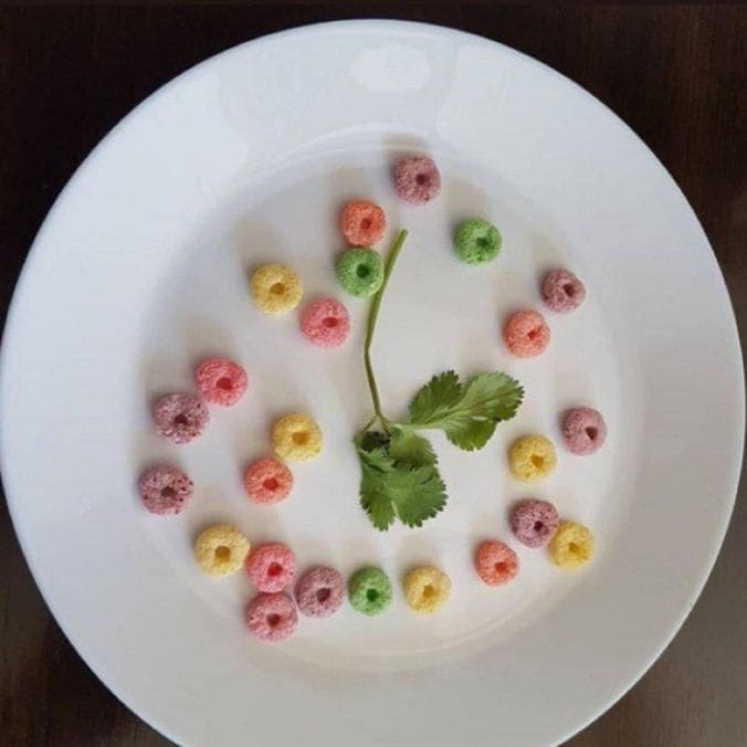 Karol G shares picture of her cooking skills: a twig of cilantro surrounded by Fruit Loops