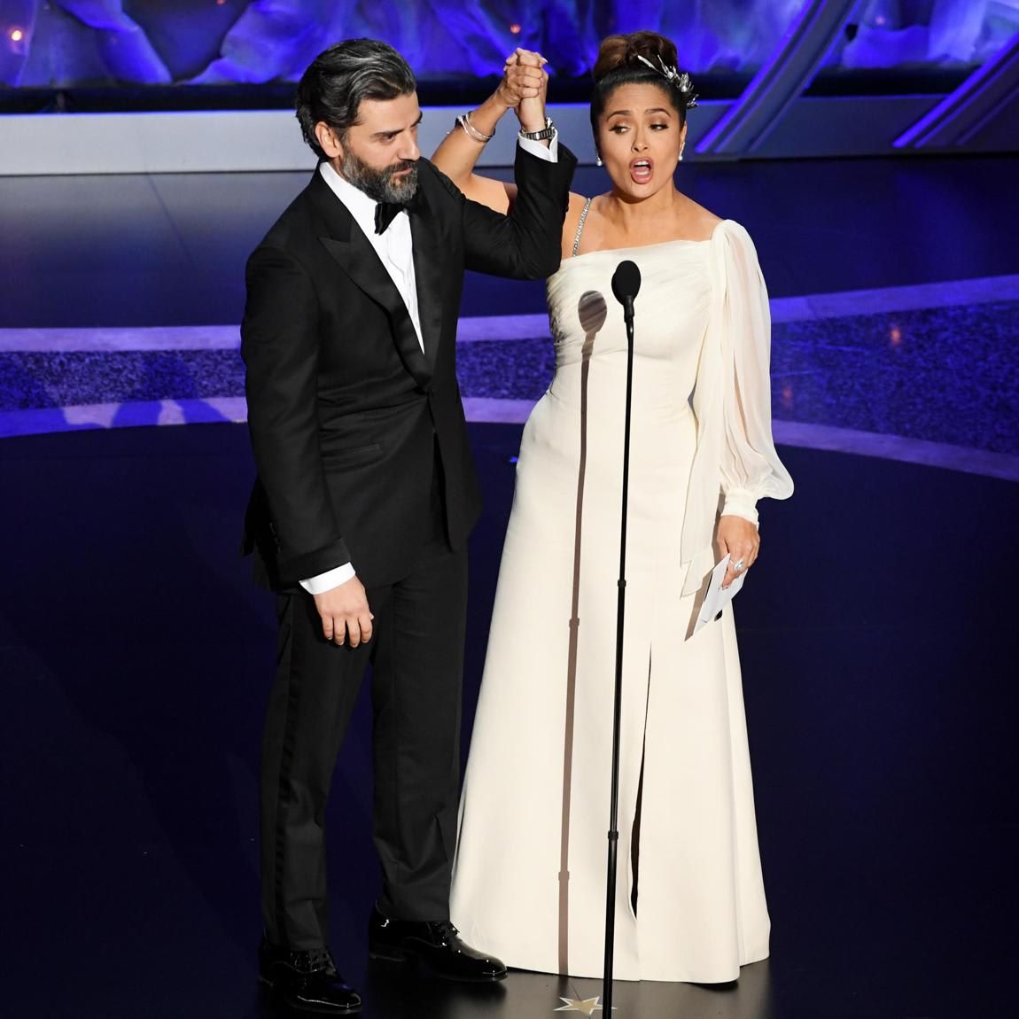 The actress (pictured with Oscar Isaac) joked that she finally held an Oscar on the stage