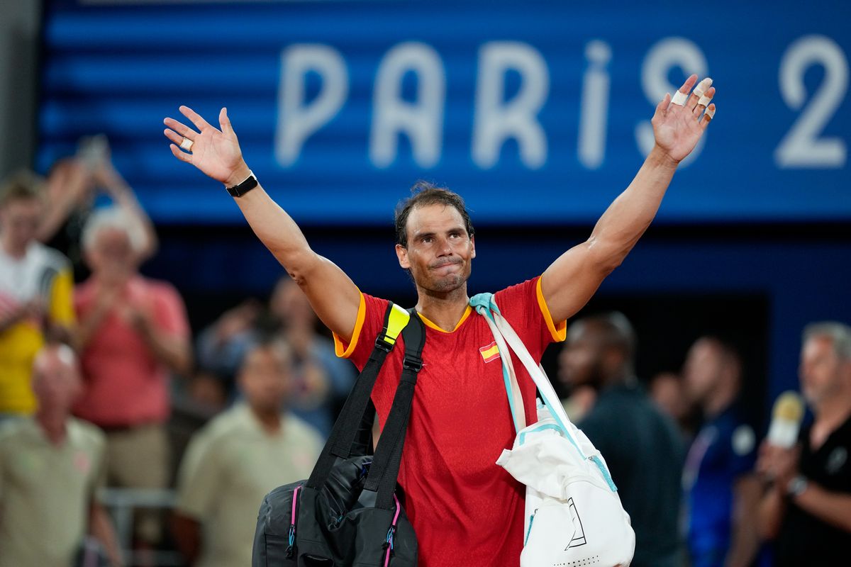 Rafael Nadal of Spain waves to the crowd after losing in the Men's Double Quarterfinal on day five of the Olympic Games Paris 2024 at Roland Garros on July 31, 2024, in Paris, France. (Photo by Eurasia Sport Images/Getty Images)