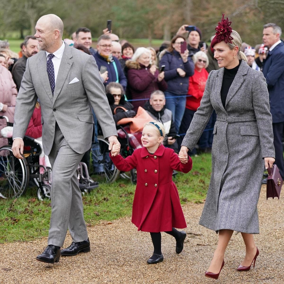 Mike and Zara Tindall with their youngest daughter Lena, who, like Louis, made her royal Christmas walk debut this year