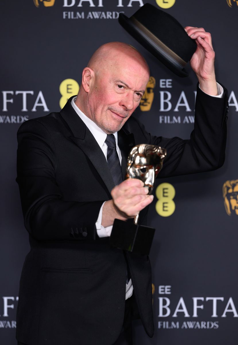 Jacques Audiard poses in the winners room at the 2025 BAFTA Film Awards in London.