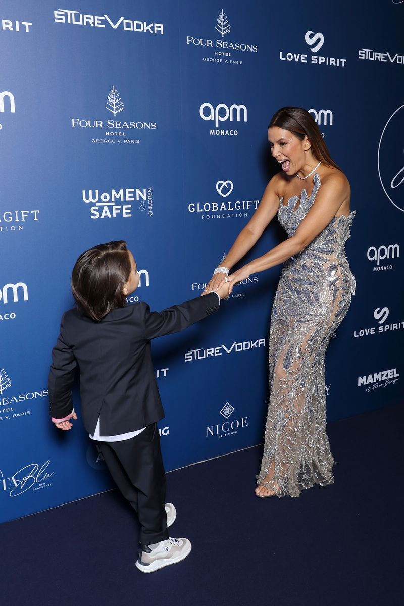 Eva Longoria holds hands with her 6-year-old son Santiago while attending  the Global Gift Gala