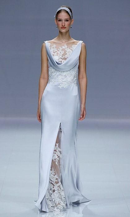 Carlo Pignatelli combined embroidered lace and silk with a softly draped neckline to stunning effect in this blue wedding dress shown at Barcelona Bridal Week 2018.
Photo: Getty Images