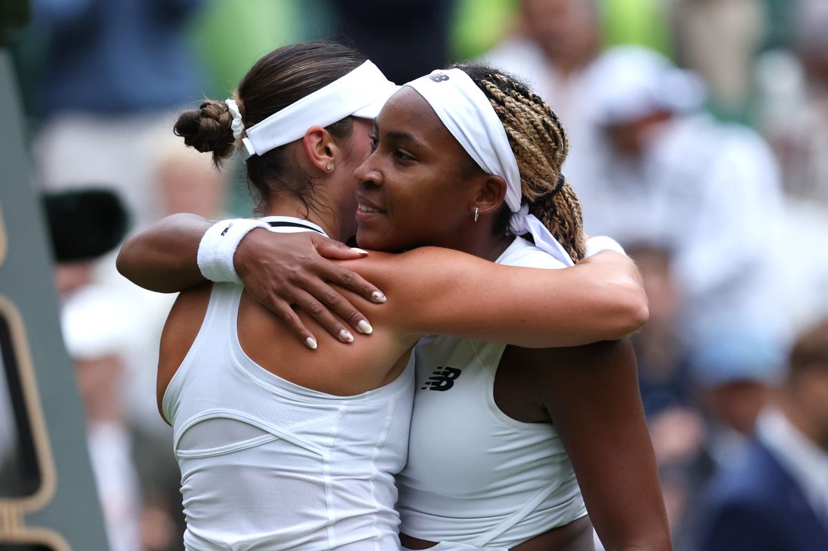 Coco Gauff of United States embraces opponent Caroline Dolehide of United States following her victory in the Ladies' Singles first round match on day one of The Championships Wimbledon 2024 at All England Lawn Tennis and Croquet Club on July 01, 2024, in London, England. 